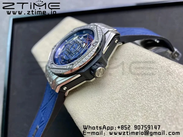 HUBLOT Big Bang Sang Bleu Titanium 415.NX WWF 1:1 Best Edition Blue Skeletonal Dial Titanium bezel with diamonds On Blue Gummy Strap Asian HB1213 - Super Clone Watch | 1:1 Best Version
